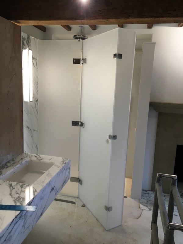 Bespoke frosted glass shower enclosure in Notting Hill luxury bathroom