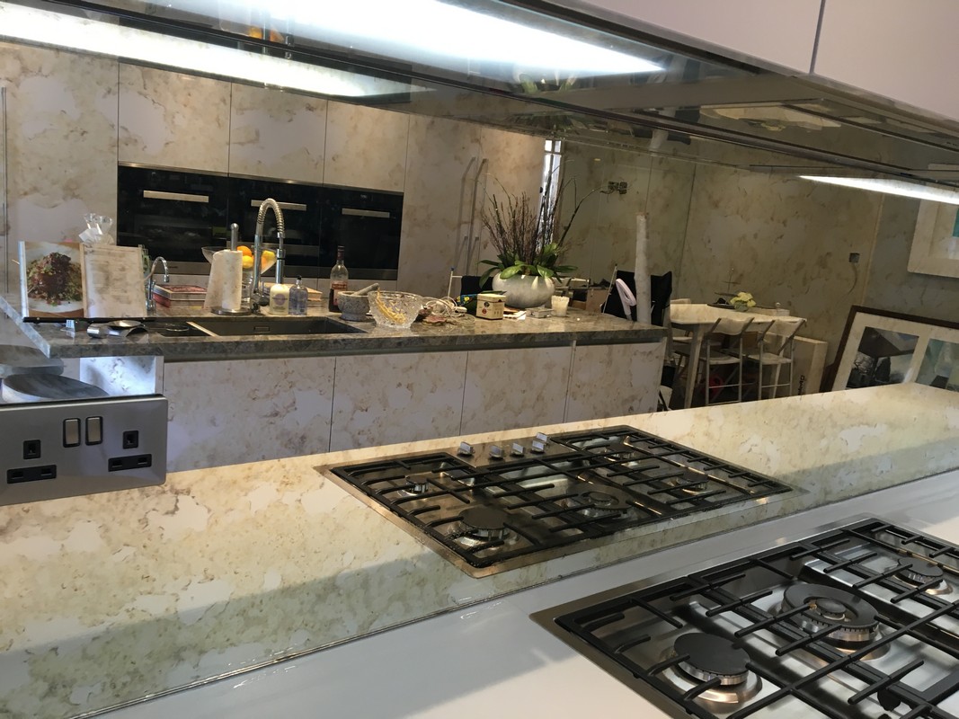 Mirror glass splashback in Notting Hill luxury kitchen